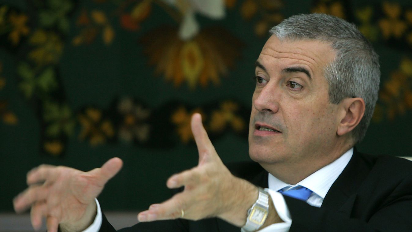 Romania's Prime Minister Tariceanu gestures during a meeting with foreign press correspondents in Bucharest