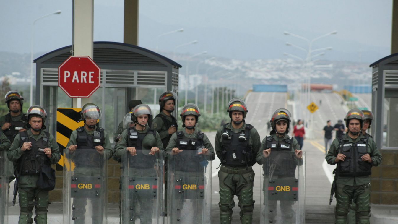 Venezuelan National Guards stand guard at the entrance of the Tienditas cross-border bridge between Colombia and Venezuela in Tienditas