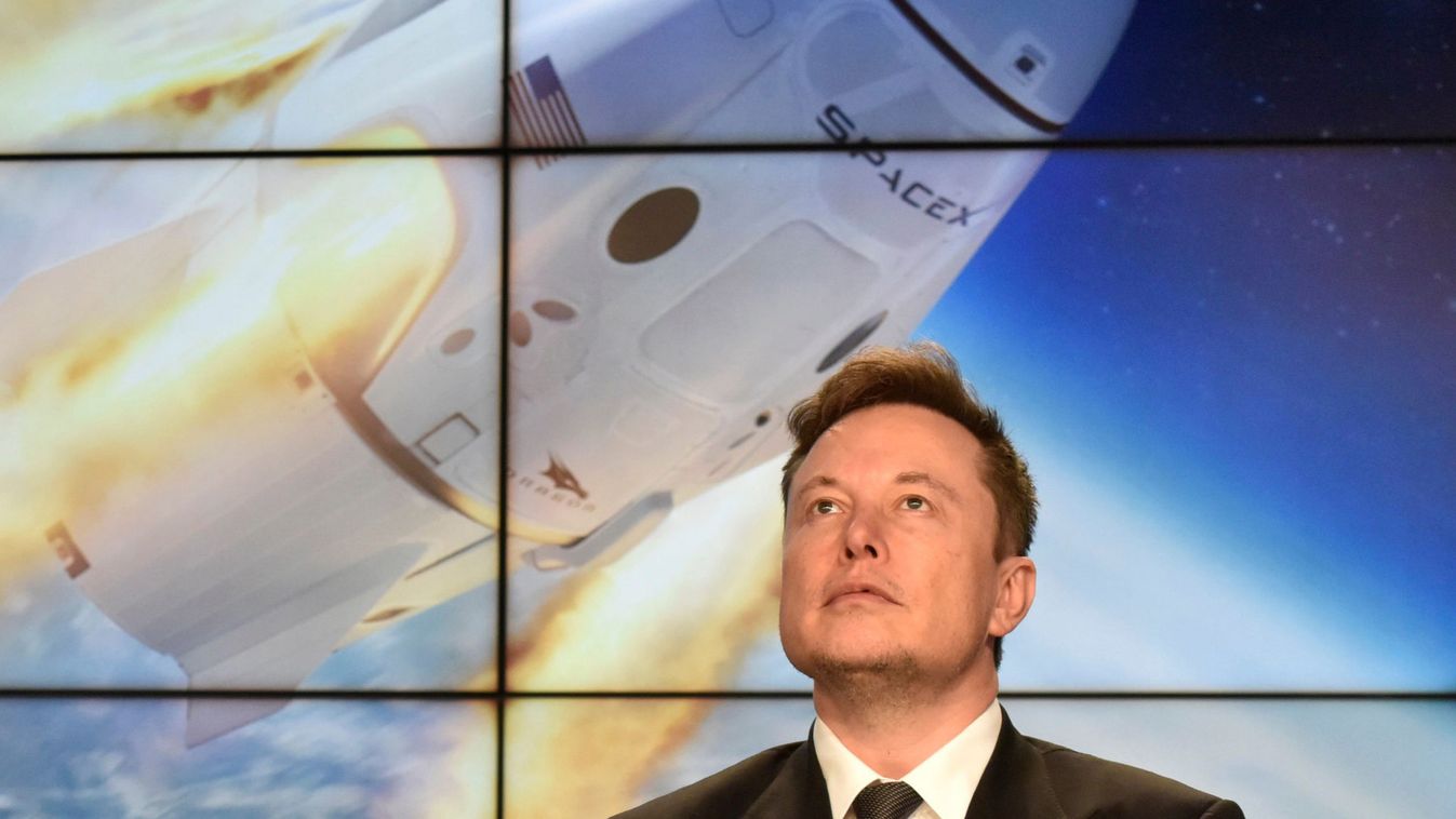 SpaceX founder and chief engineer Elon Musk attends a post-launch news conference to discuss the  SpaceX Crew Dragon astronaut capsule in-flight abort test at the Kennedy Space Center
