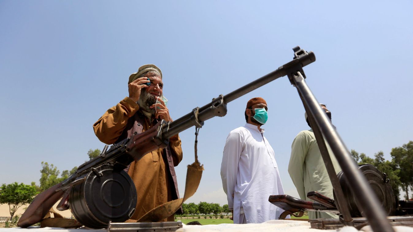 Members of the Taliban handover their weapons and join in the Afghan government's reconciliation and reintegration program in Jalalabad, Afghanistan