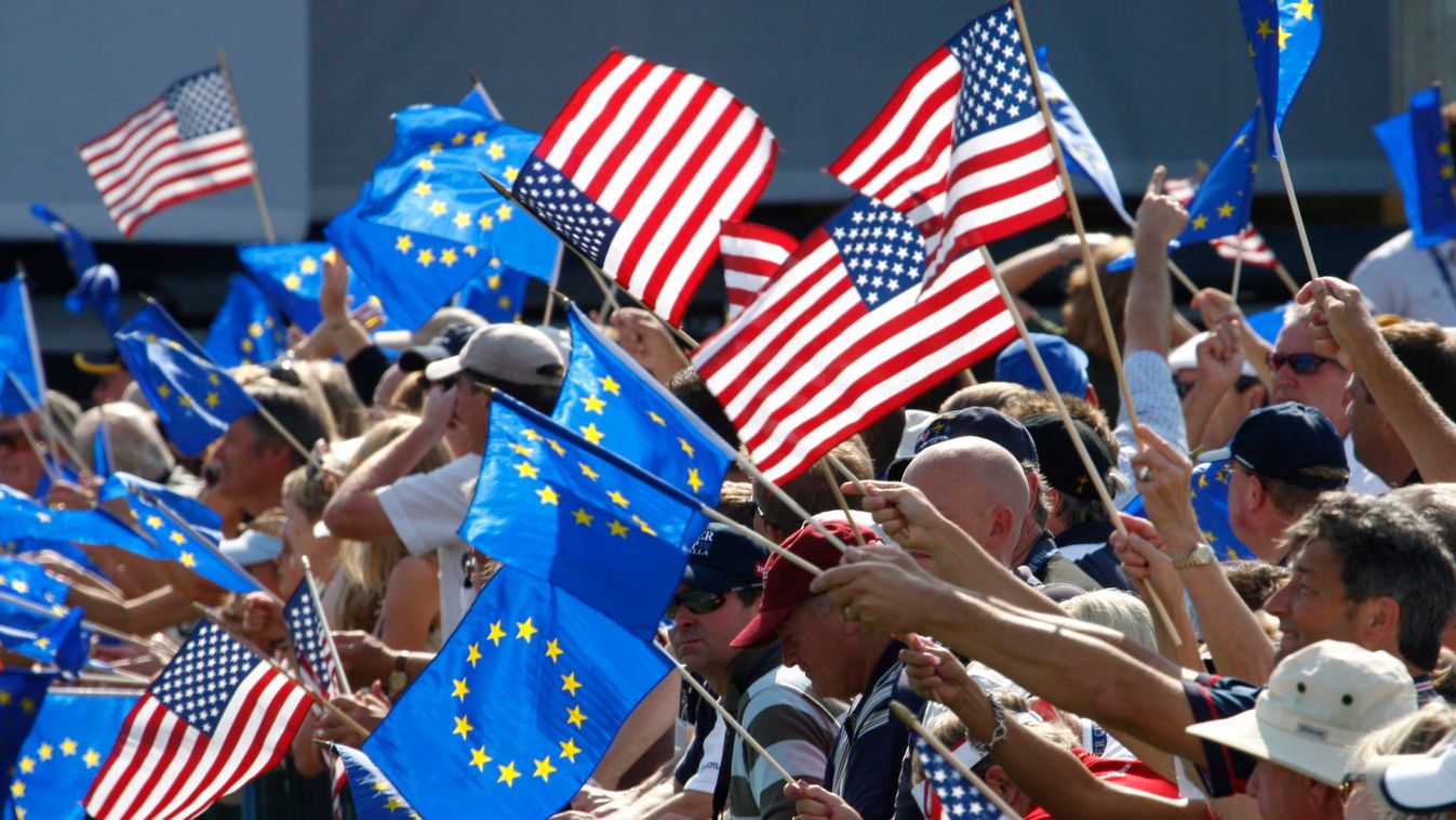 European Union and American flags are carried by patrons during opening ceremonies for the 37th Ryder Cup Championship at the Valhalla Golf Club in Louisville
