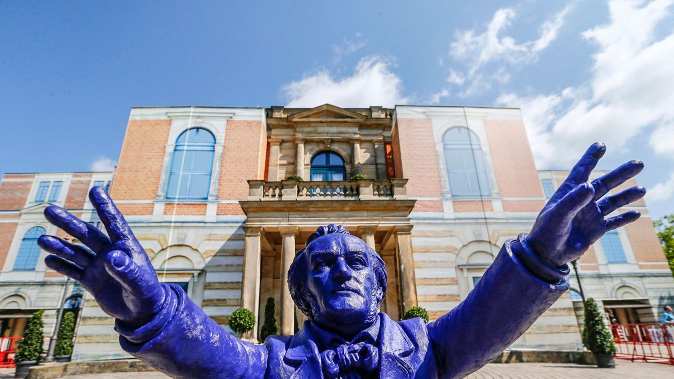 A sculpture of German composer Wagner by German artist Hoerl is seen outside the opera house in Bayreuth