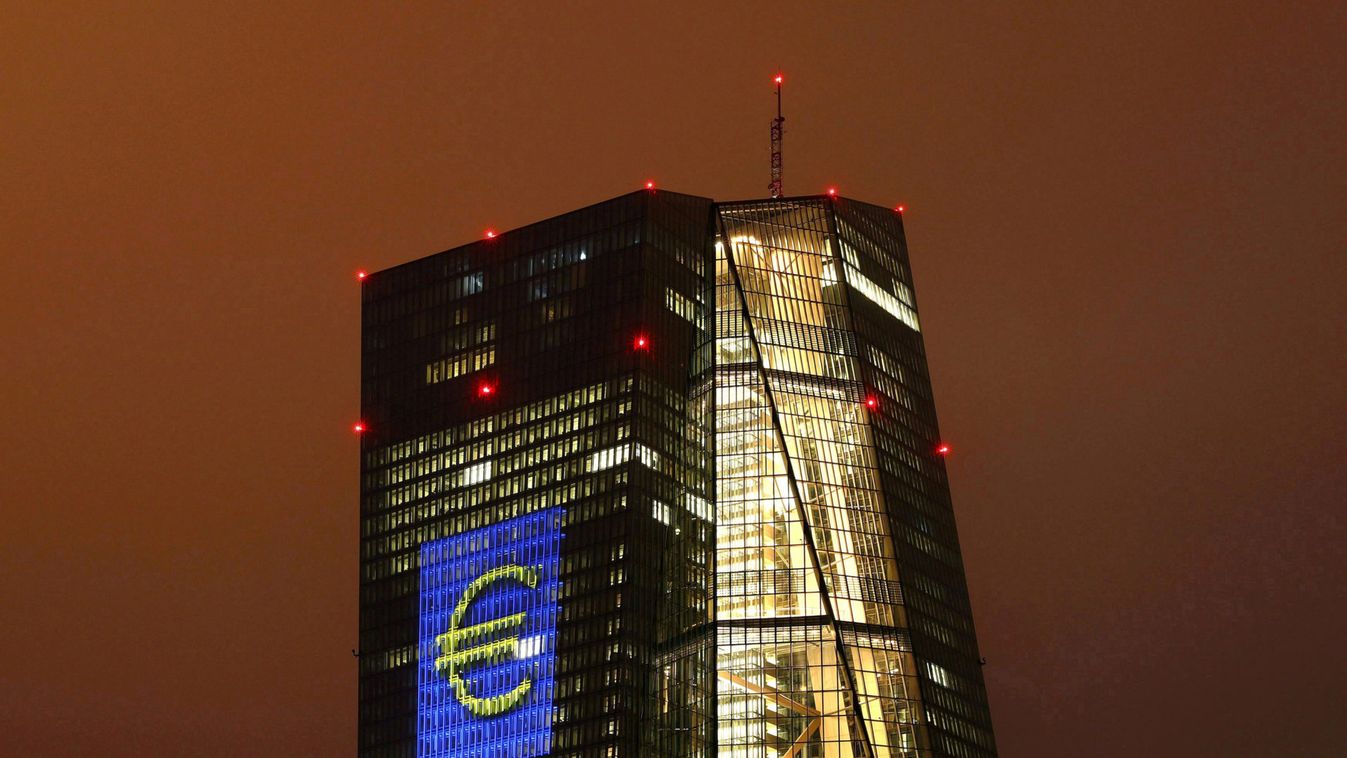 Headquarters of the European Central Bank (ECB) are illuminated with a giant euro sign at the start of the "Luminale, light and building" event in Frankfurt