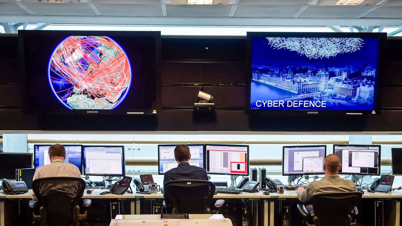 People sit at computers in the 24 hour Operations Room inside GCHQ, Cheltenham in Cheltenham