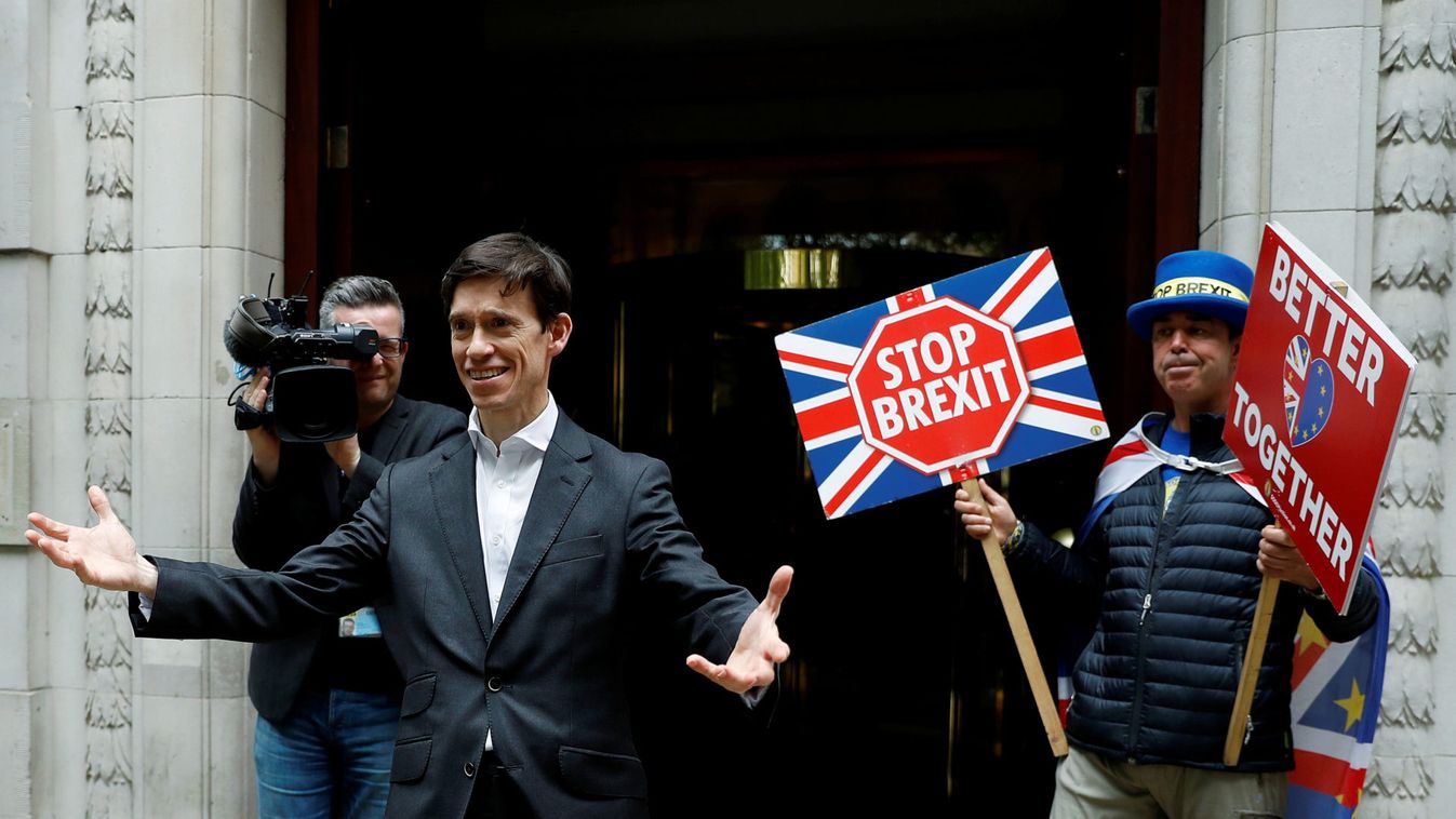 PM hopeful Rory Stewart emerges from TV studios in Westminster, London