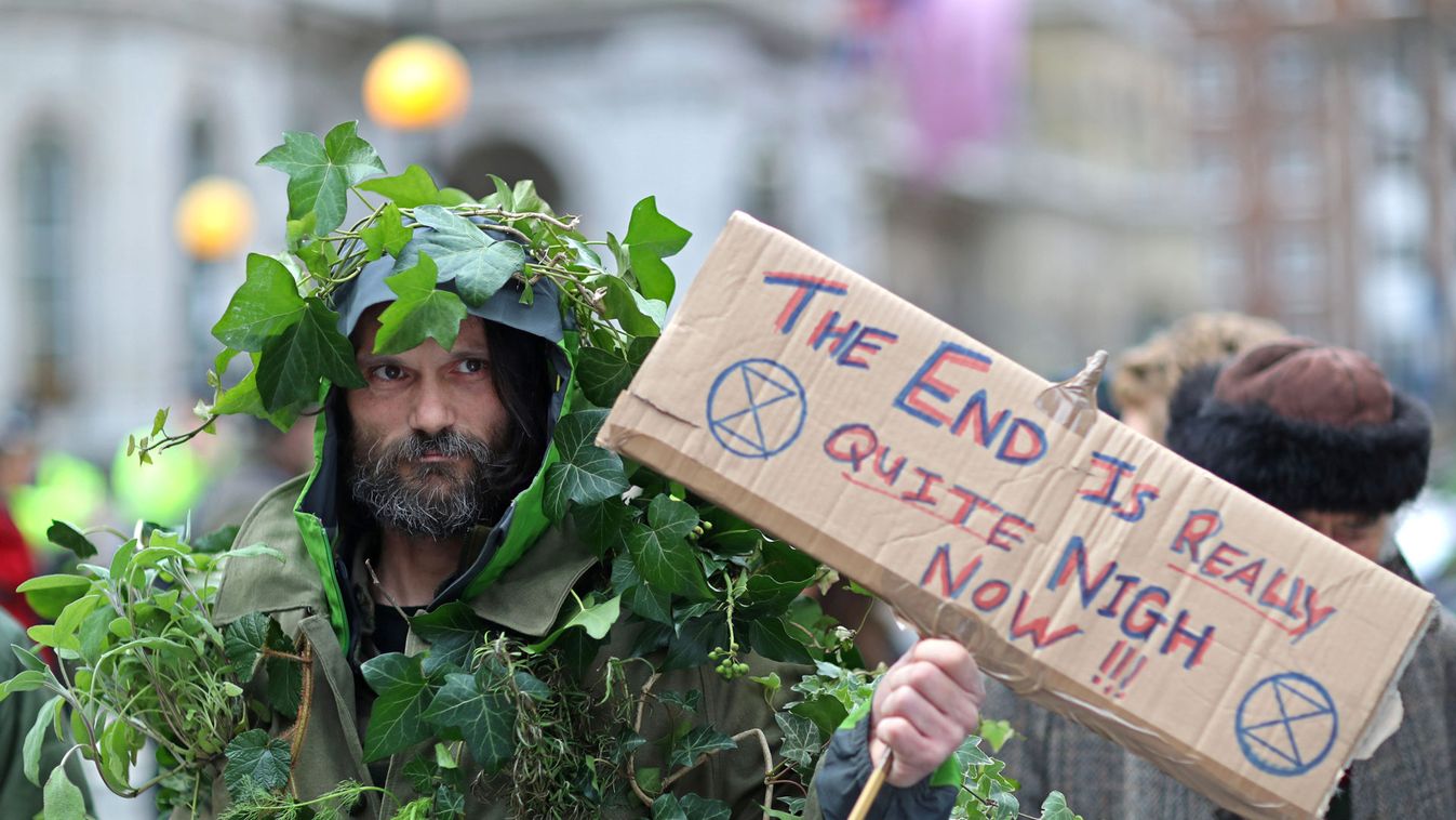 Protesters from the climate change pressure group Extinction Rebellion demonstrate outside the BBC offices in central London