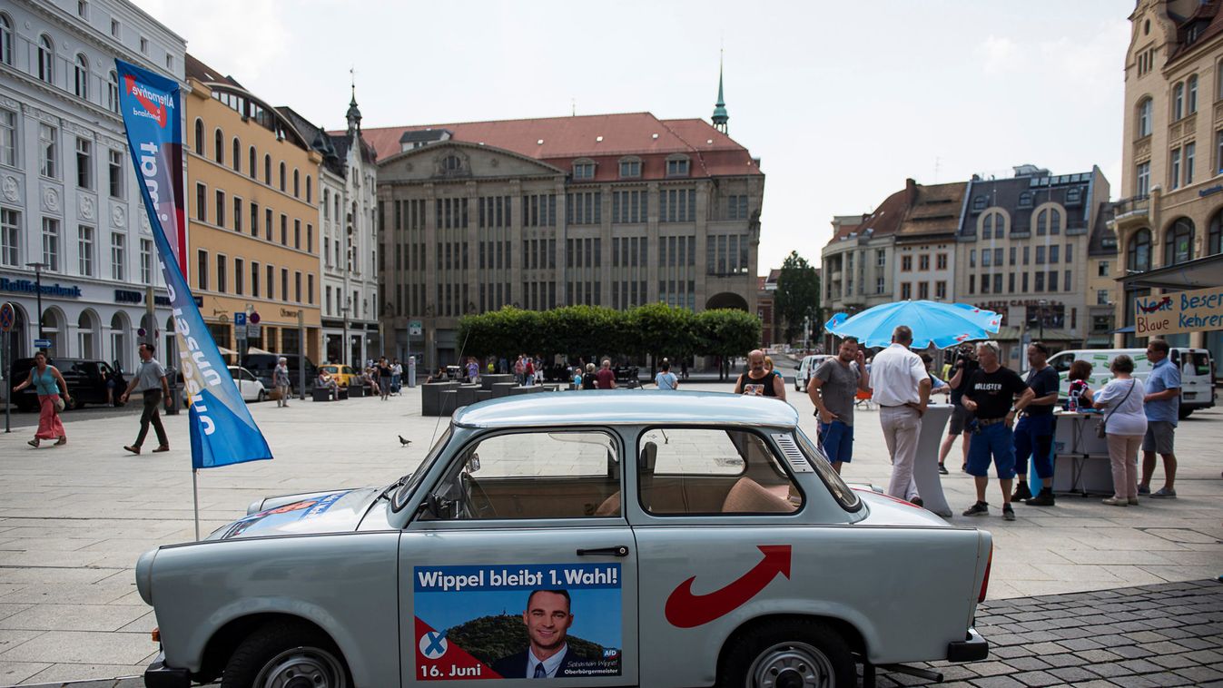 A banner on east German Traban car promotes Sebastian Wippel of Alternative for Germany (AfD) election campaign on the Marienplatz in Goerlitz
