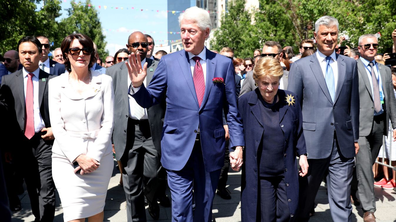 Former President of Kosovo Atifete Jahjaga, former U.S. President Bill Clinton, Madeleine Albright, and President of Kosovo Hashim Thaci, walk during the 20th anniversary of the Deployment of NATO Troops in Kosovo in Pristina