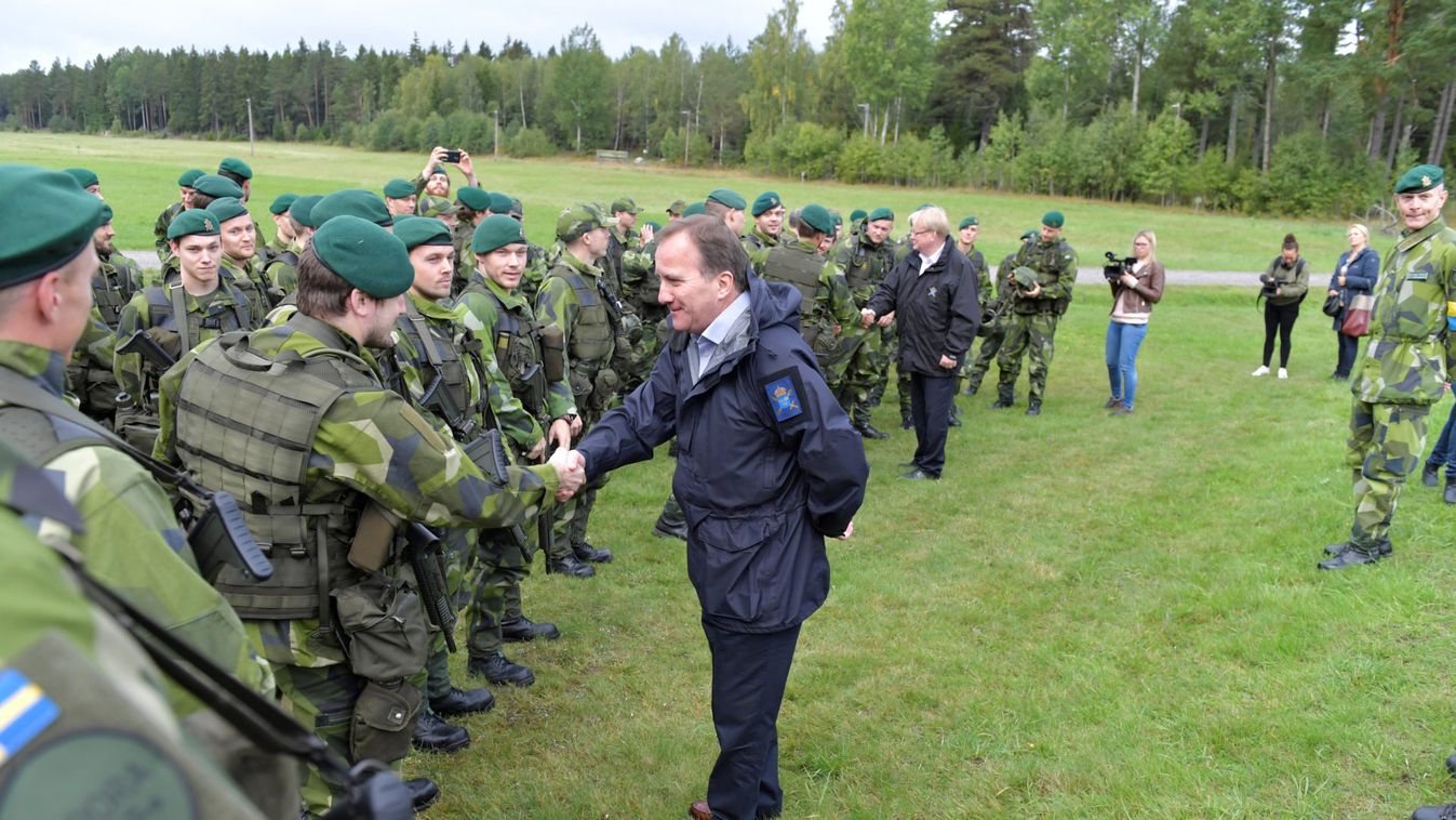 Sweden's Prime Minister Stefan Lofven meets soldiers taking part in the military exercise Aurora 17 at the Amphibious Regiment  - Amf 1 at Berga outside Stockholm