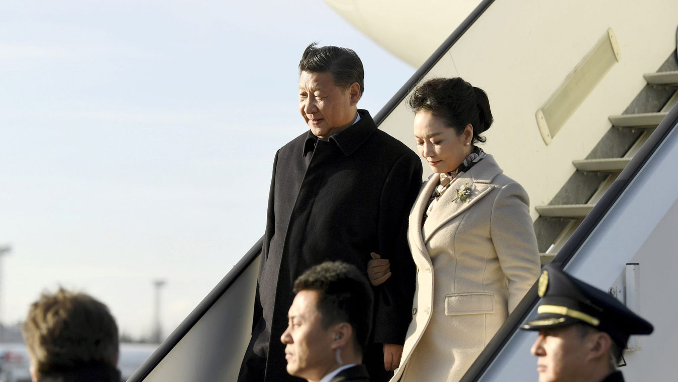 China's President Xi Jinping and his wife, Peng Liyuan, arrive at Helsinki Airport in Vantaa