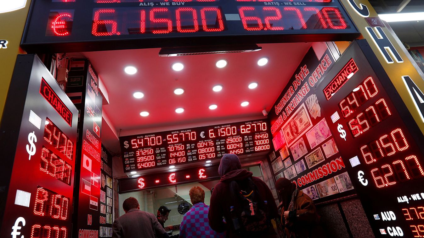 People change money at a currency exchange office in Istanbul