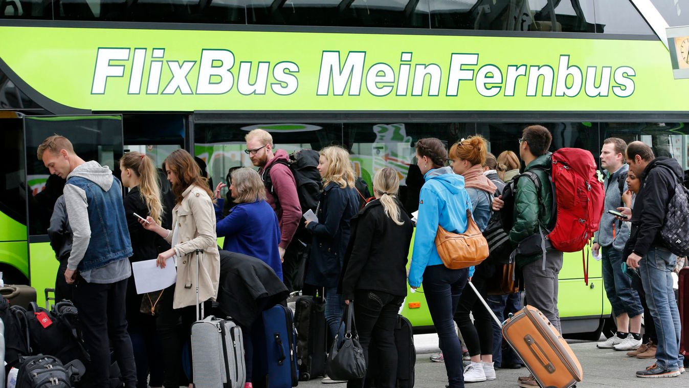 Passengers board a bus of 'FlixBus' coach operator at the main bus station (ZOB) during a strike of train drivers' union GDL in Berlin