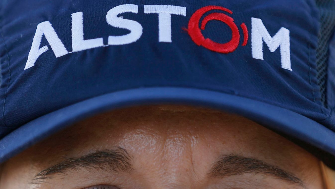 Logo of French engineering group Alstom is seen on a cap of an employee at the plant in Aytre near La Rochelle