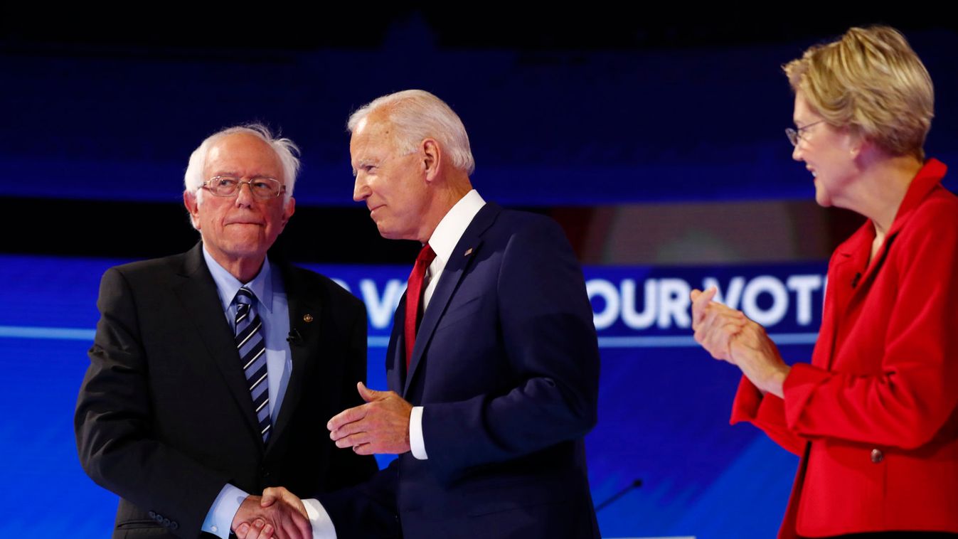 Candidates Sanders, Biden and Warren take the stage for the start of the 2020 Democratic U.S. presidential debate in Houston, Texas, U.S.