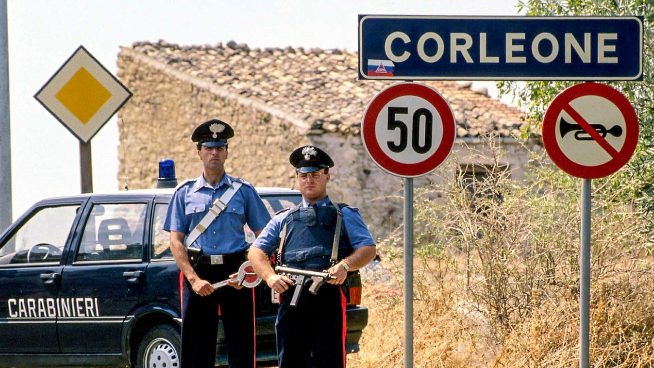 File photo of Italian carabinieri standing guard outside Sicilian town of Corleone