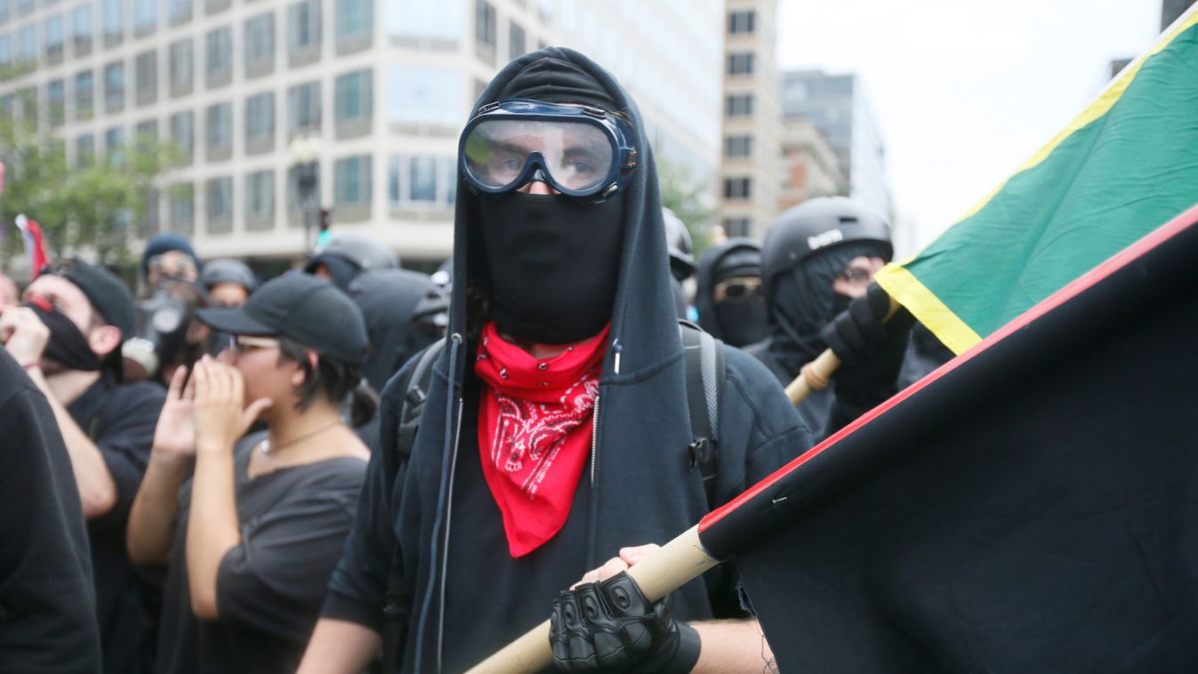 Antifa, opponents of white nationalist Jason Kessler's group, march during a rally in Washington