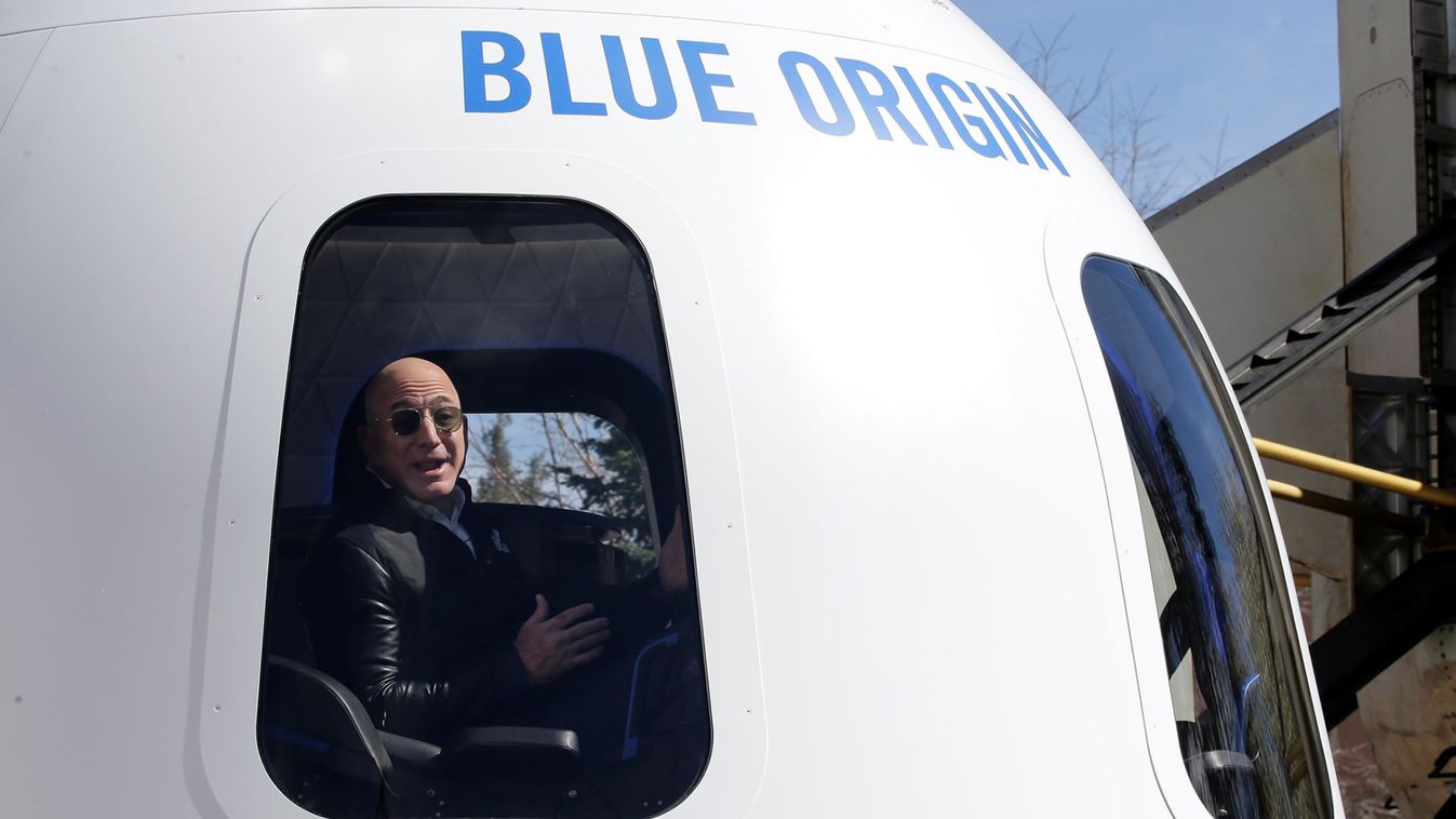 Amazon and Blue Origin founder Jeff Bezos addresses the media about the New Shepard rocket booster and Crew Capsule mockup at the 33rd Space Symposium in Colorado Springs