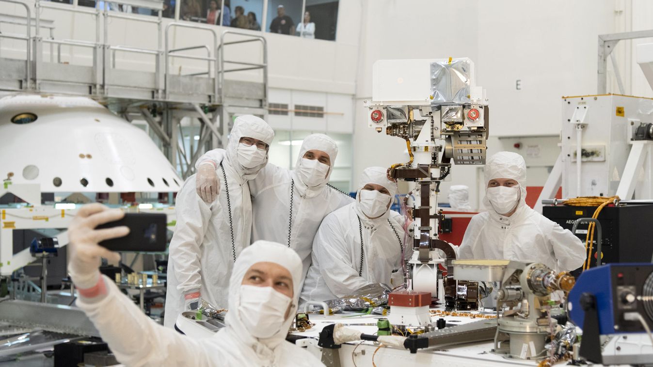 Handout photo of members of NASA's Mars 2020 project assembling the Mars 2020 rover in Pasadena