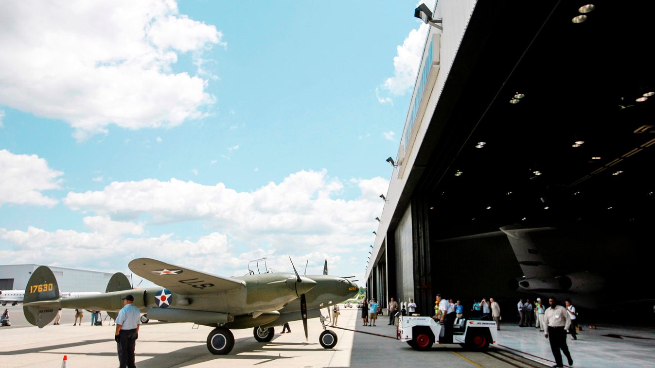 The "Glacier Girl" is wheeled out of a hangar at Teterboro Airport in Teterboro, New Jersey