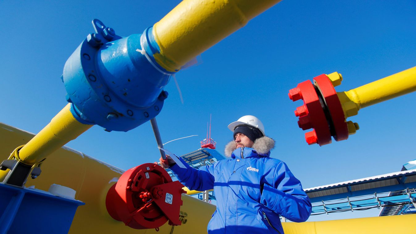 An employee checks a gas valve at the Atamanskaya compressor station, part of Gazprom's Power Of Siberia gas pipeline outside the far eastern town of Svobodny