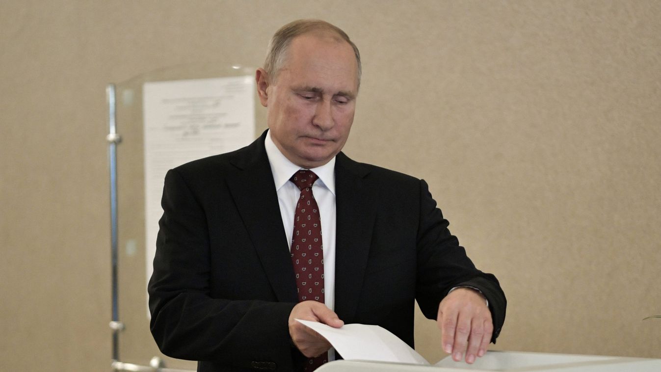 Russia's President Putin casts his ballot at a polling station during the Moscow city parliament election in Moscow