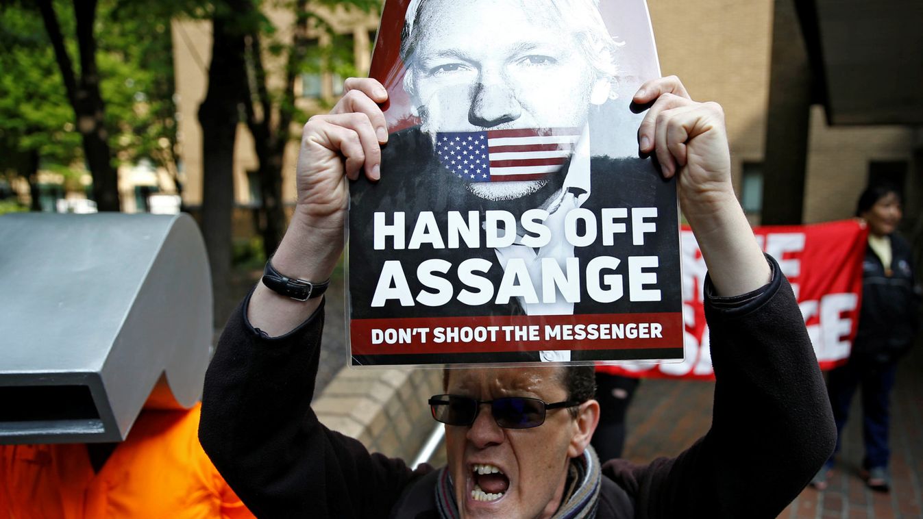 People protest outside Southwark Crown Court where WikiLeaks founder Julian Assange will be sentenced, in London