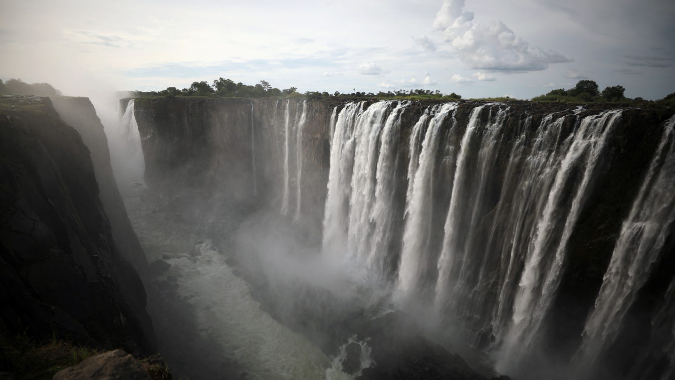 Water pours over the edge of Victoria Falls