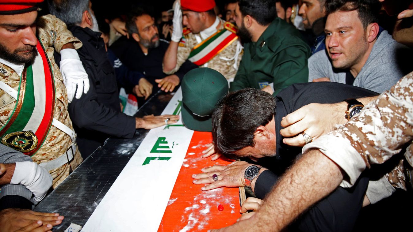 Iranian mourners carry the coffin of the Iraqi militia commander Abu Mahdi al-Muhandis, who was killed in an air strike at Baghdad airport, at Ahvaz international airport, in Ahvaz