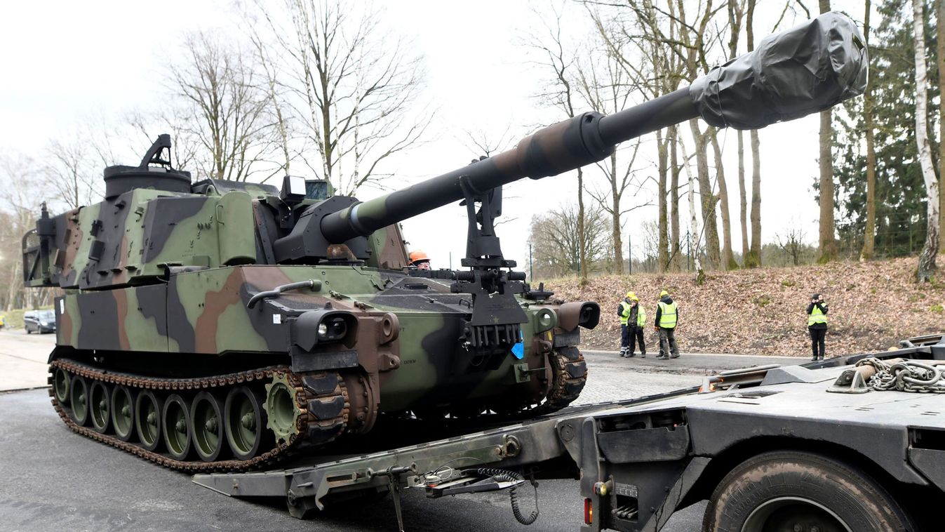 Soldiers of German Army Bundeswehr load a U.S. M109 tank onto a heavy goods transporter during preparations for the Defender-Europe 20 international military exercises in Bergen Hohne