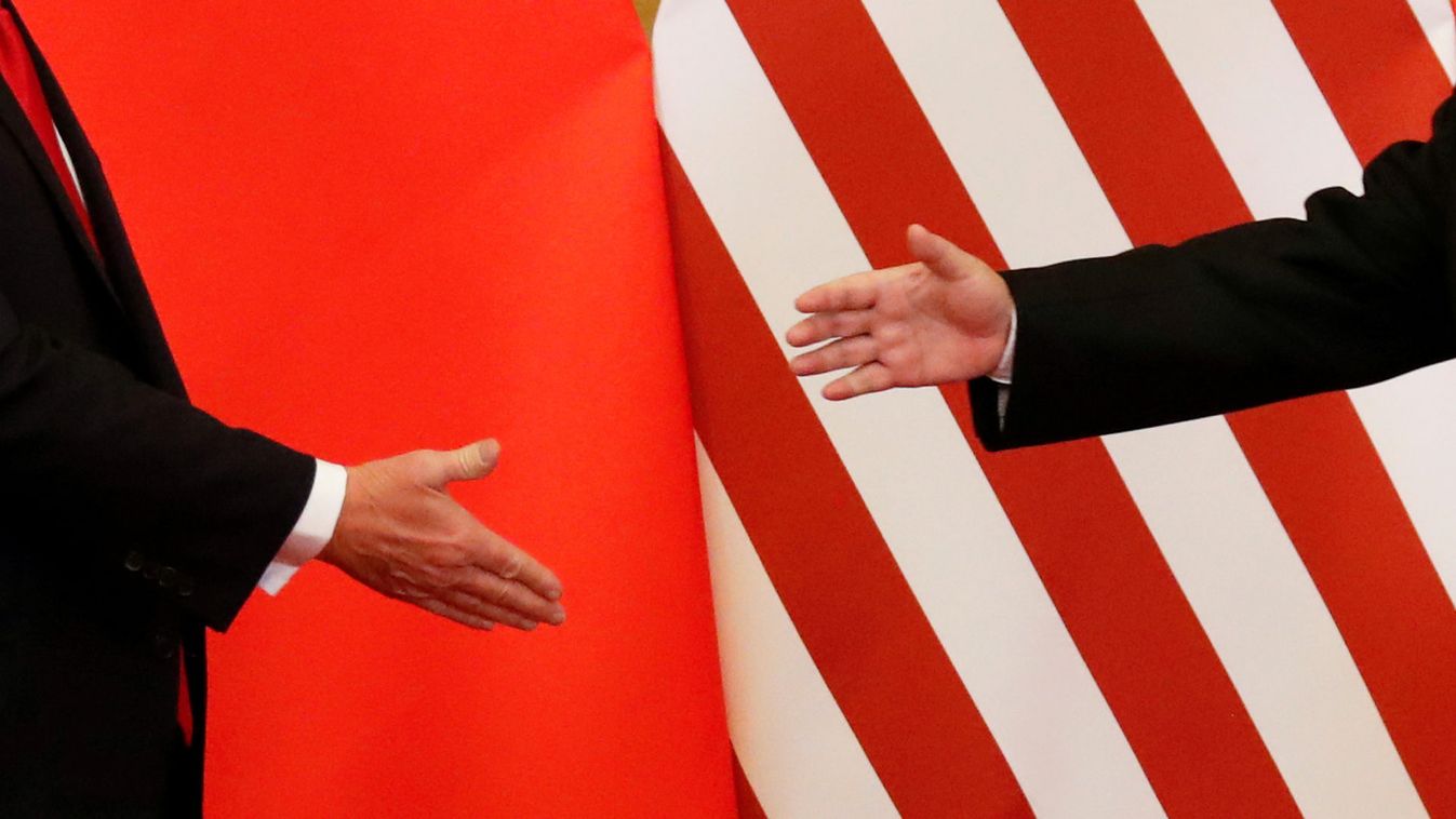 U.S. President Donald Trump and China's President Xi Jinping shakes hands after making joint statements at the Great Hall of the People in Beijing
