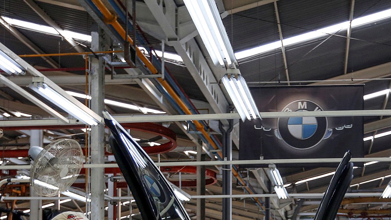 Workers assemble a new BMW X3 vehicle for local distribution at a Gaya Motor assembly plant, part of Astra International, in Jakarta