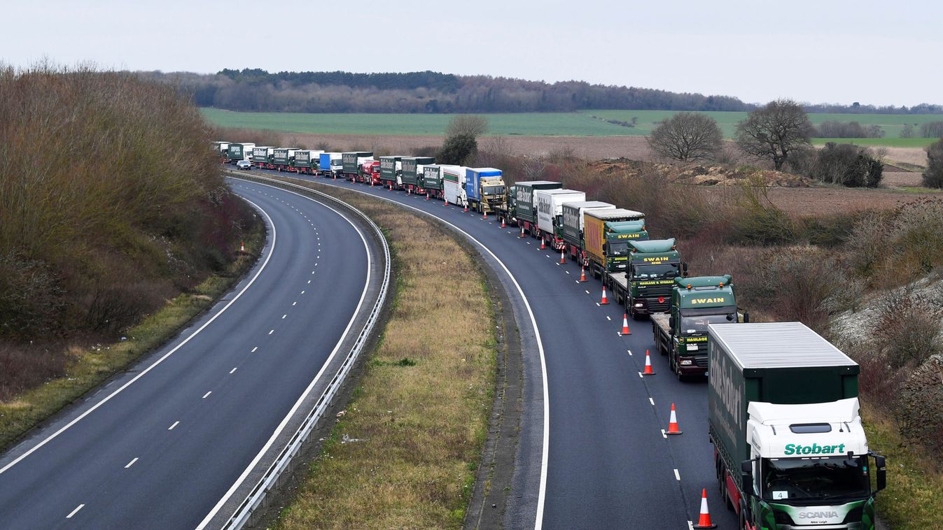 A line of lorries is seen during a trial between disused Manston Airport and the Port of Dover of how road will cope in case of a "no-deal" Brexit, Kent