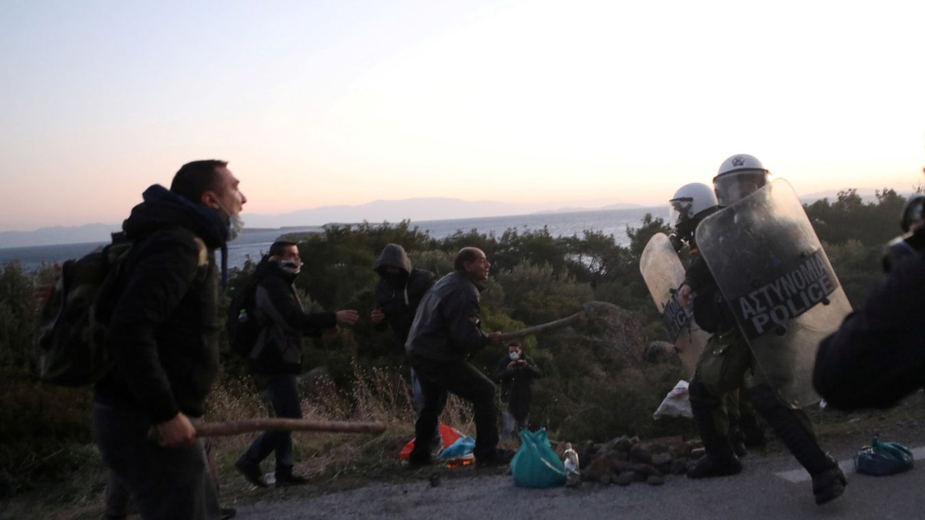 Locals scuffle with riot police at the area where the government plans to build a new closed migrant detention centre scuffle, in Karava on the island of Lesbos