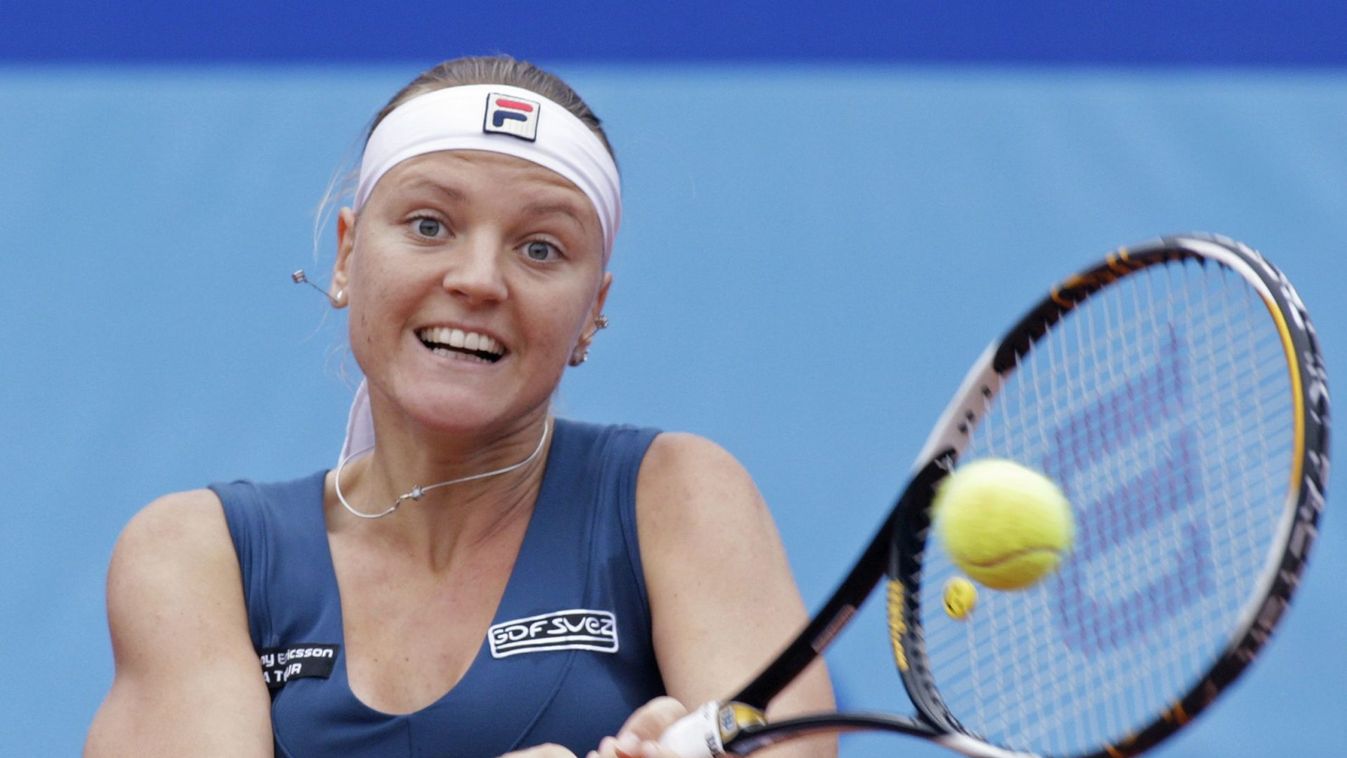 Hungary's Szavay returns the ball to Czech Republic's Strycova during their final match at the Prague Open tennis in Prague