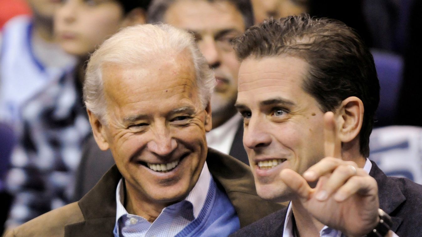 U.S. Vice President Biden and his son Hunter attend an NCAA basketball game between Georgetown University and Duke University in Washington