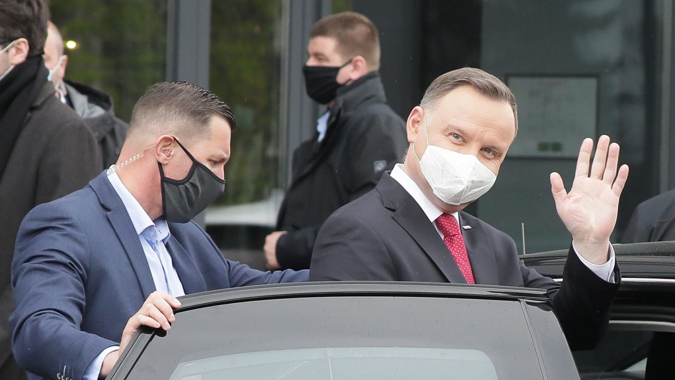Polish President Andrzej Duda wears a protective face mask as he arrives for his Election Campaign following the outbreak of the coronavirus disease (COVID-19) in Warsaw