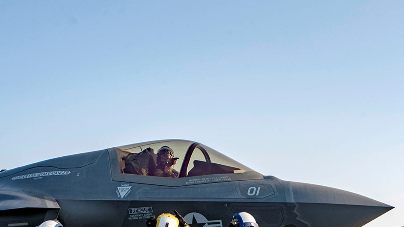 A U.S. Navy handout photo of sailors preparing a F-35B Lightning II A aircraft for launch aboard the amphibious assault ship USS Essex as part of the F-35B's first combat strike, against a Taliban target in Afghanistan