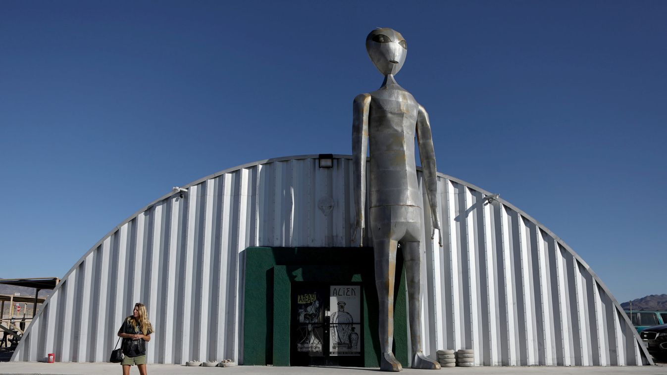 People visit the Alien Research Center in Hiko, as an influx of tourists responding to a call to 'storm' Area 51, is expected in Rachel, Nevada
