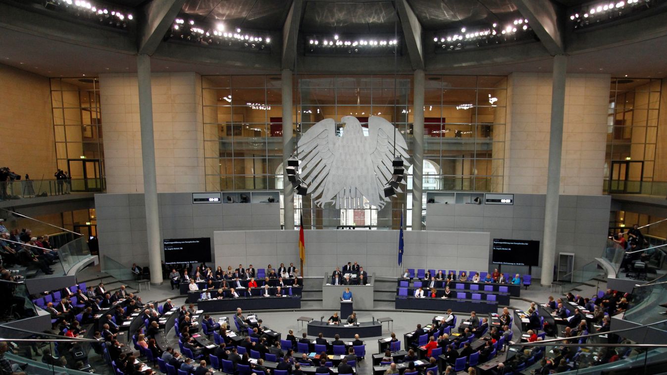 German Chancellor Angela Merkel speaks to members of Germany's lower house of parliament Bundestag in Berlin