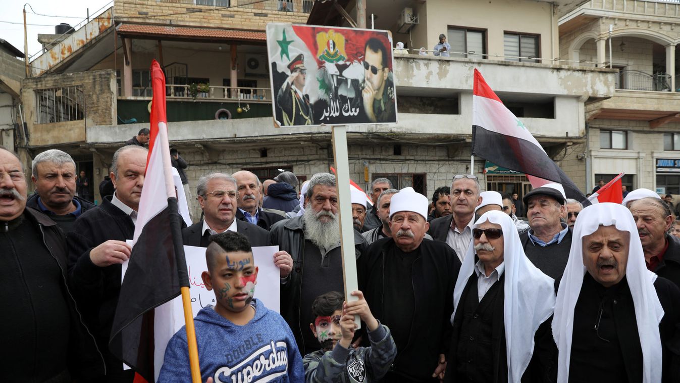 Druze people take part in a rally over U.S. President Donald Trump's support for Israeli sovereignty over the Golan Heights, in Majdal Shams near the ceasefire line between Israel and Syria in the Israeli occupied Golan Heights