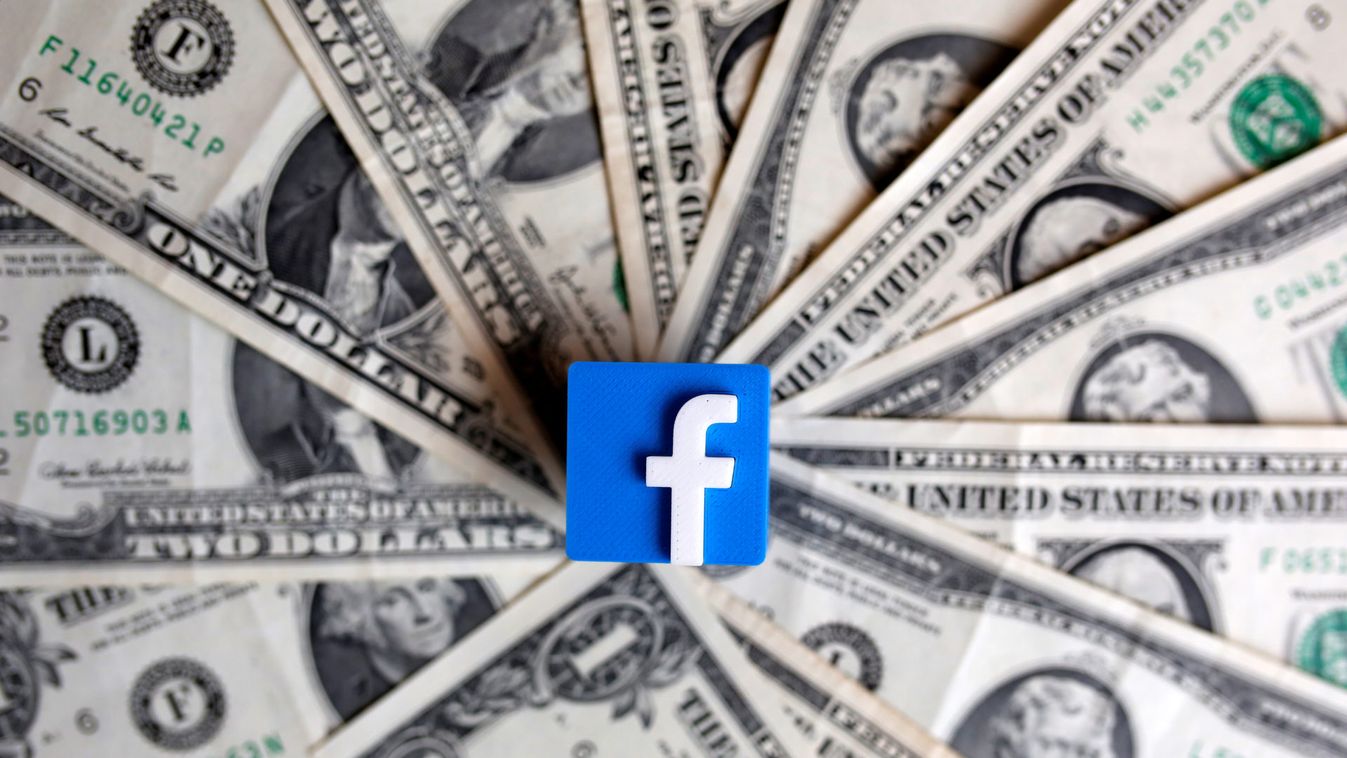 A 3-D printed Facebook logo is seen on U.S. dollar banknotes in this illustration picture