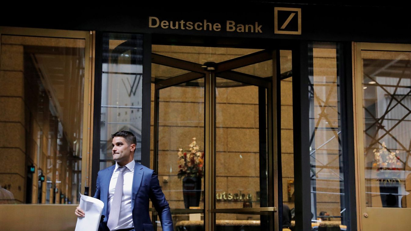 A man walks out of the U.S. headquarters of Deutsche Bank in New York City