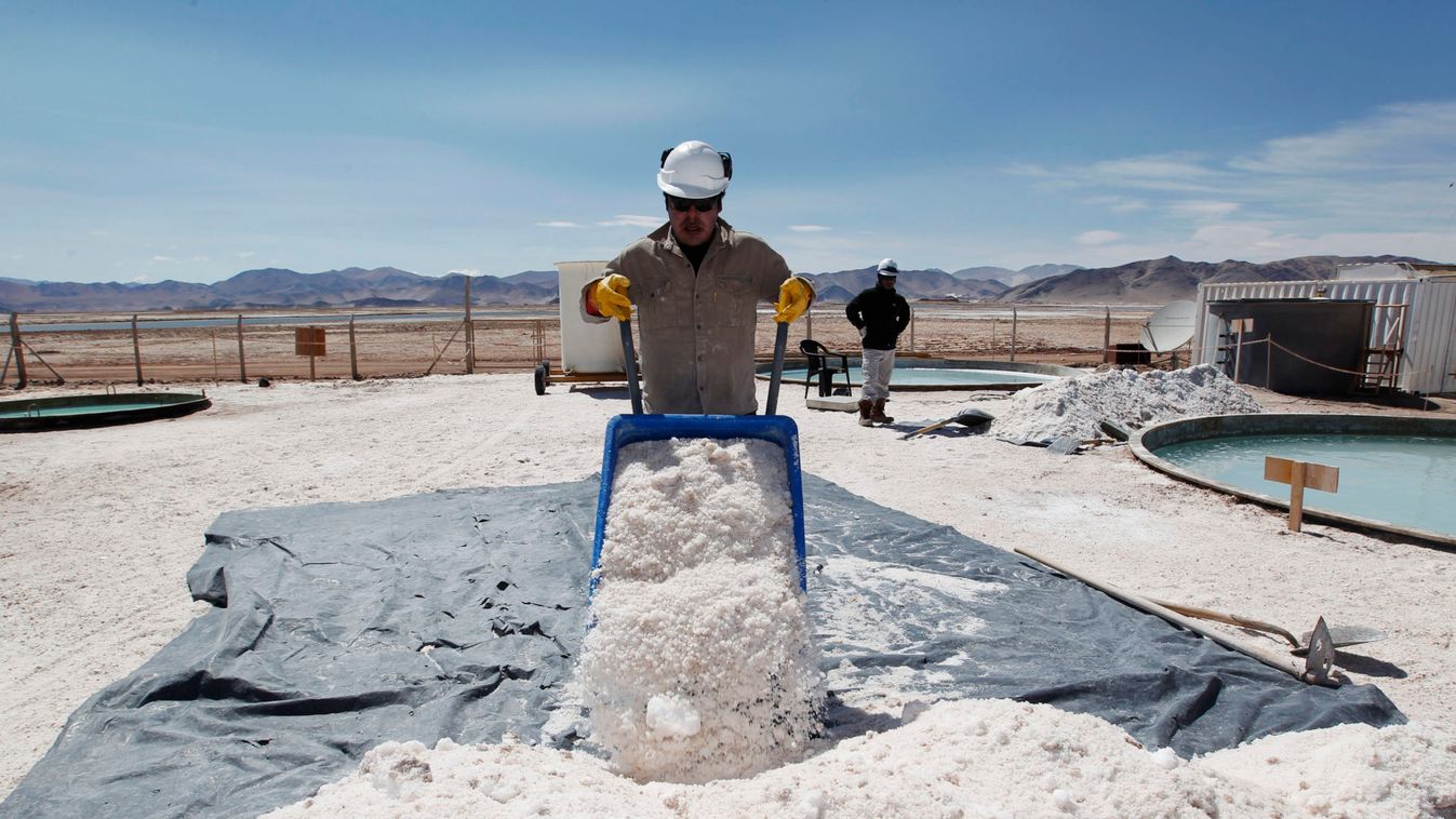 Braulio Lopez of Galaxy Resources lithium mining division carts halite concentrate at the Salar del Hombre Muerto in Salta Province