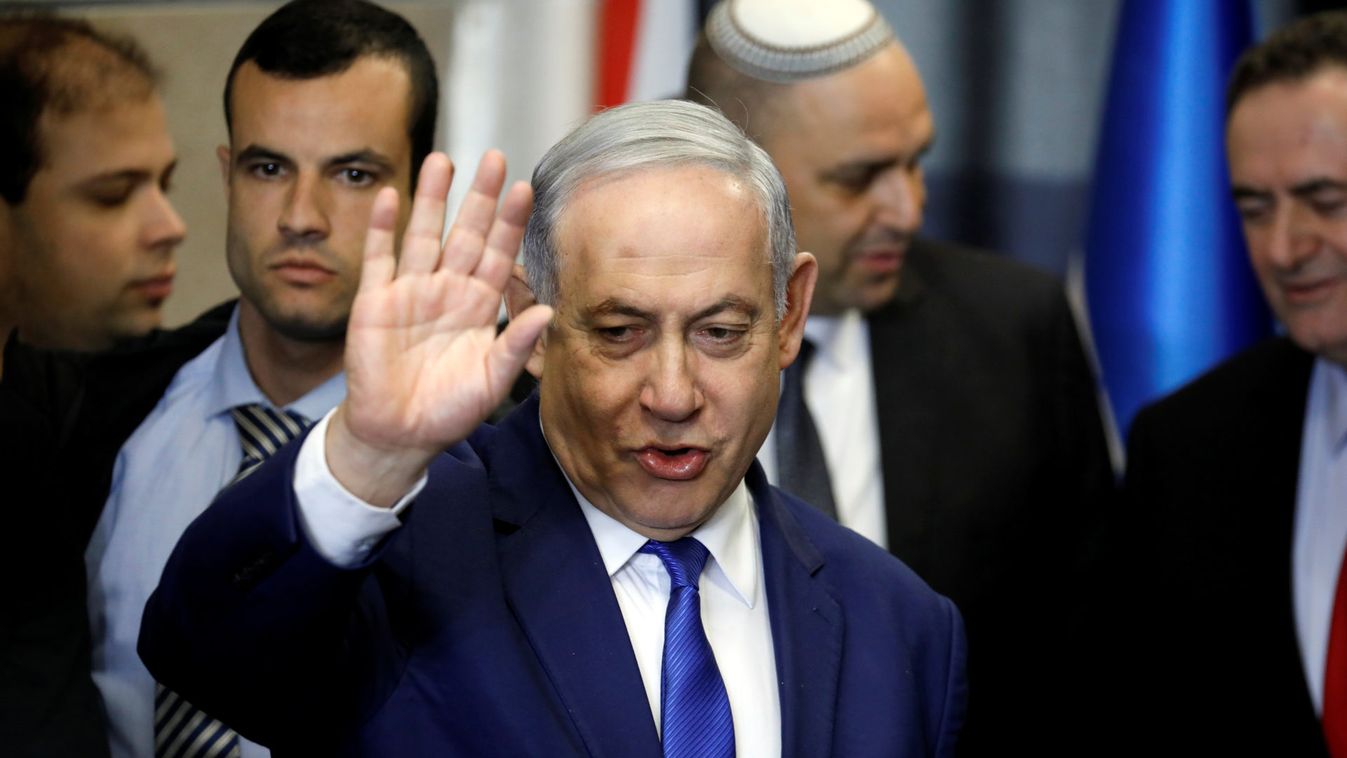 Israeli Prime Minister Benjamin Netanyahu gestures as he arrives to address the media in Airport City near Tel Aviv
