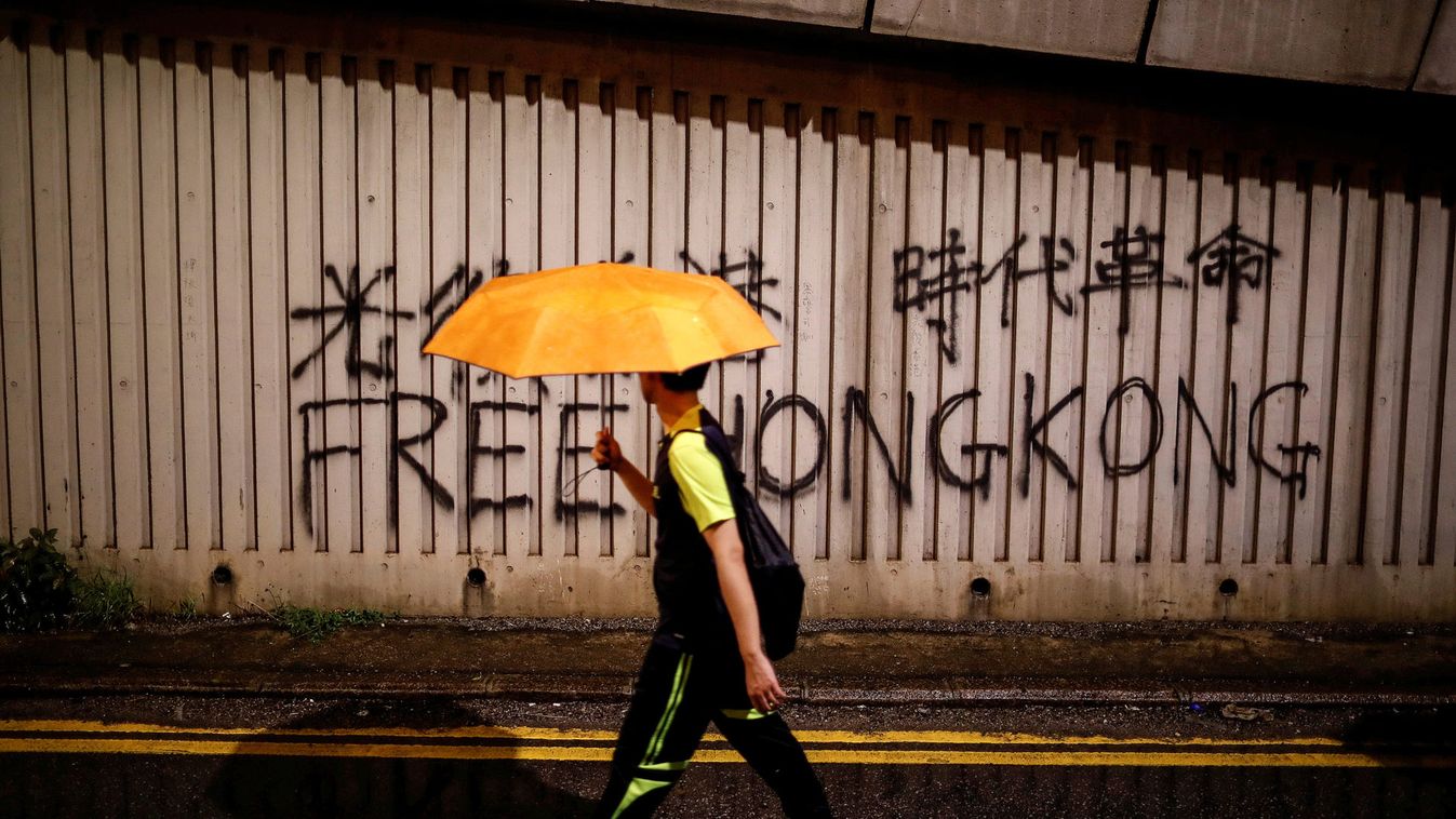 People march during a rally to demand democracy and political reforms in Hong Kong