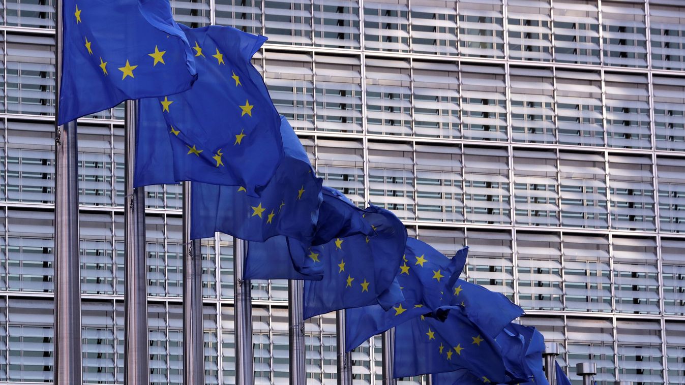 European Union flags fly outside the European Commission headquarters in Brussels
