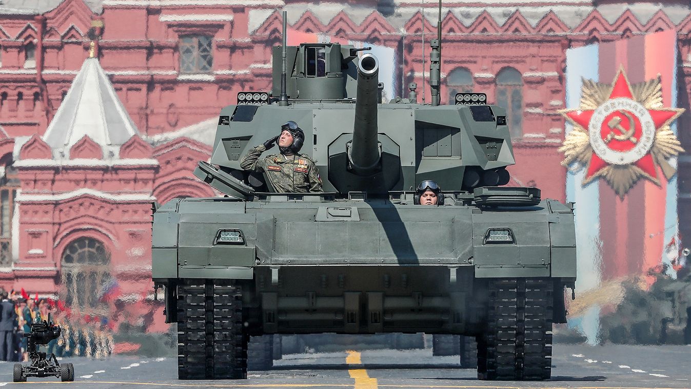 Russian servicemen drive a T-14 tank with the Armata universal combat platform during a rehearsal for the Victory Day parade in Moscow