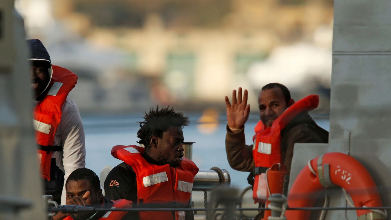 Migrants who were stranded on the NGO migrant rescue ships Sea-Watch 3 and Professor Albrecht Penck are seen on an Armed Forces of Malta patrol boat in Marsamxett Harbour