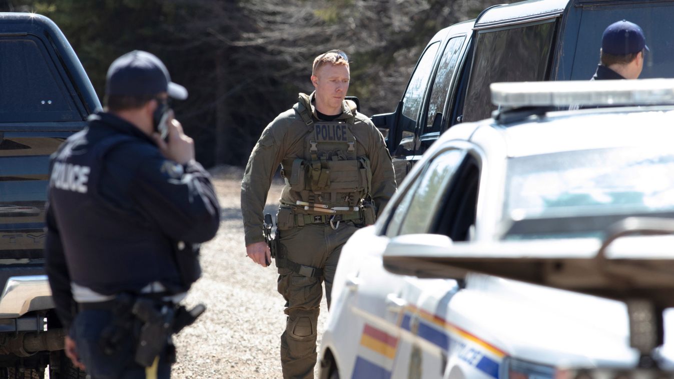 RCMP officers maintain a road block after taking Wortman into custody in Portapique