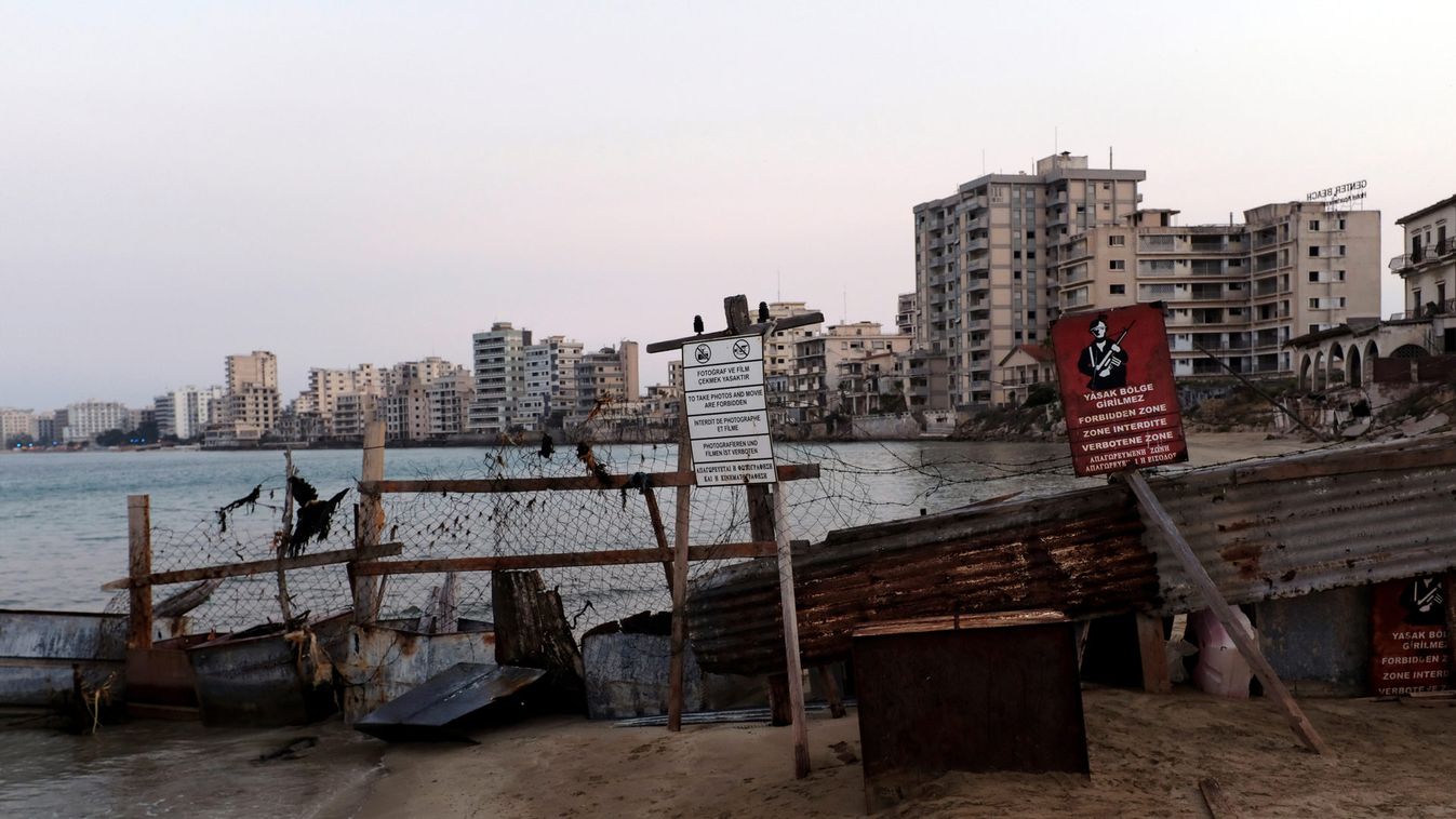 Varosha, an area fenced off by the Turkish military since the 1974 division of Cyprus, is seen from a beach in Famagusta